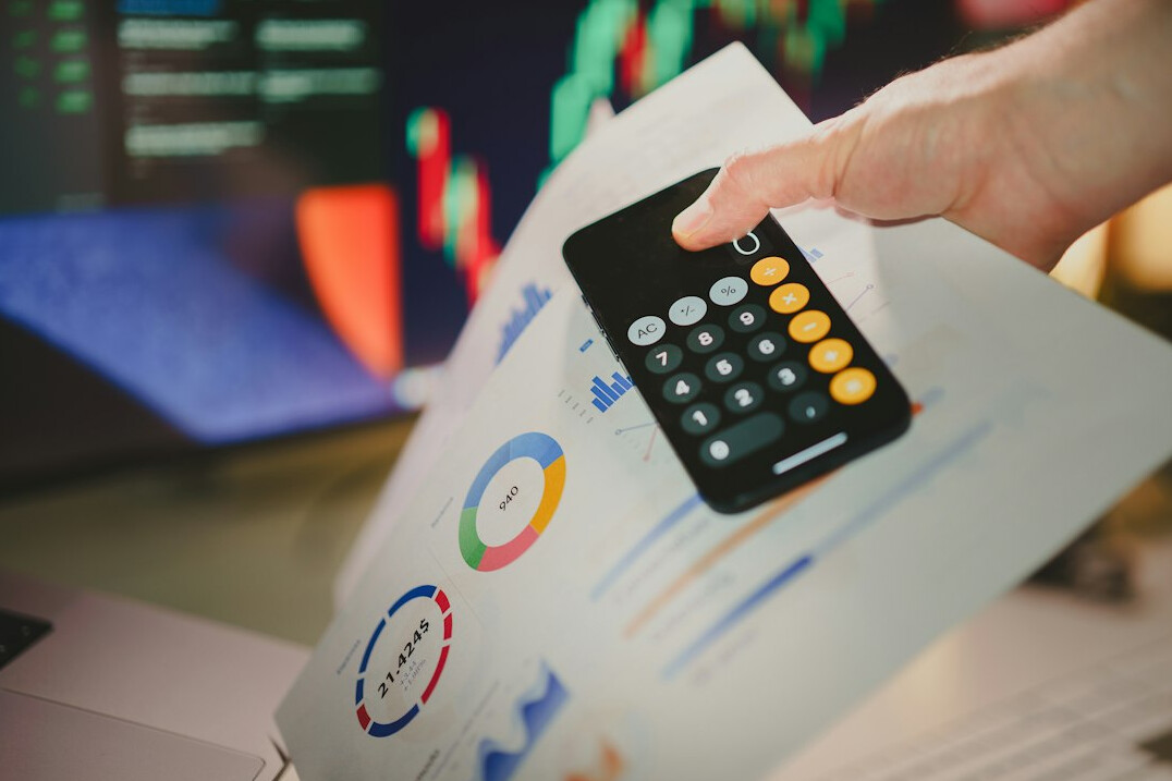 person analyzing financial reports