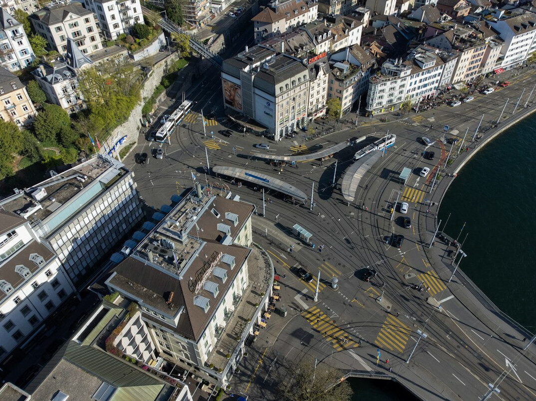 Aerial view of a Swiss financial district with office towers along a river